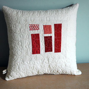 red patchwork pillow